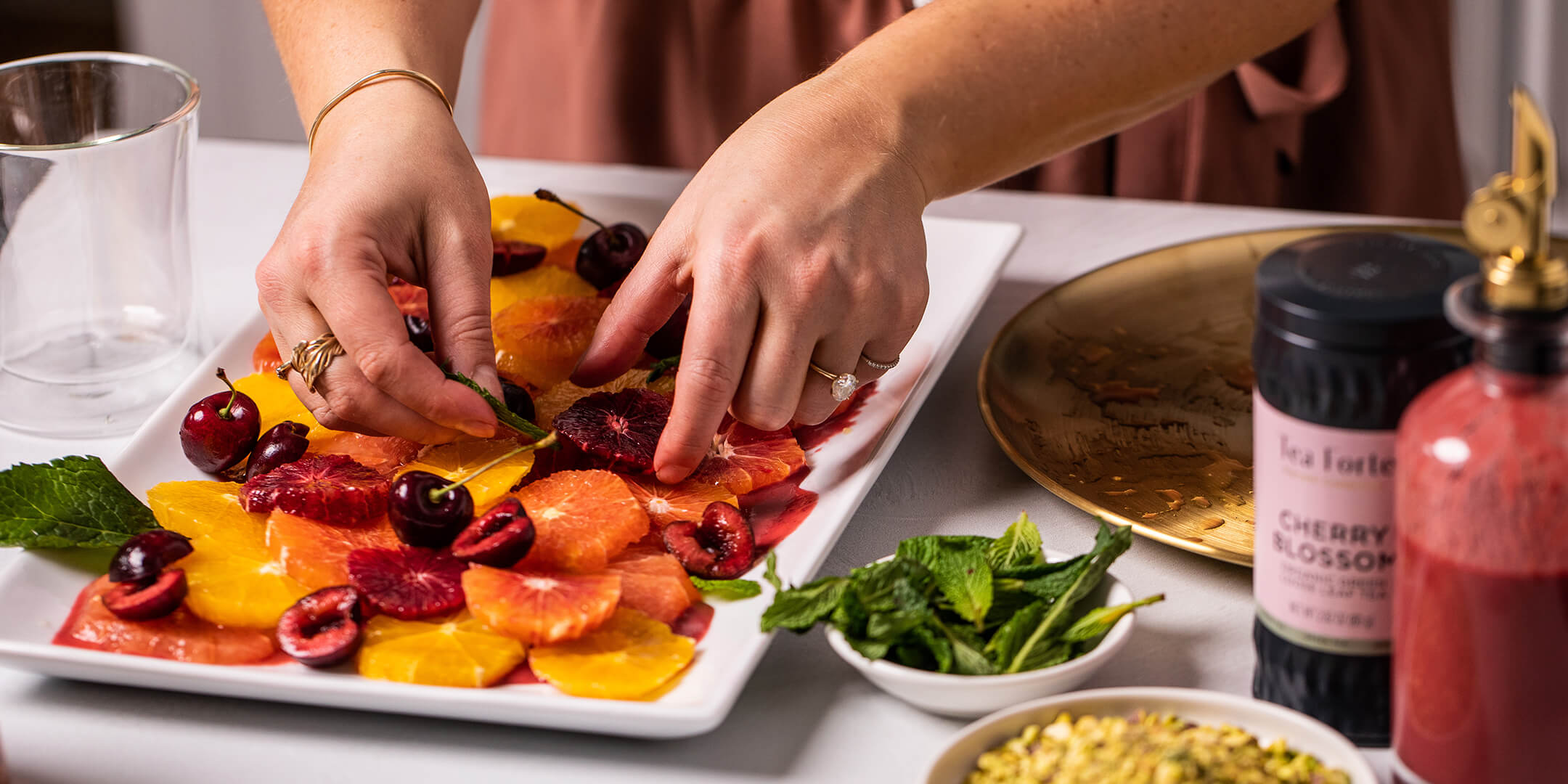 Making Citrus Salad & Cherry Blossom Vinaigrette
in a kitchen